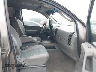 2007 Nissan Titan XE with VIN 1N6BA07A87N219609, listed as a IAAI auction lot 41451297 with 300,263 mi miles. Bid and sale history available at carsss.com. Image 5.