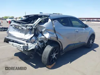 2020 Toyota C-HR LE with VIN JTNKHMBX4L1088502, listed as a IAAI auction lot 41982312 with 69,160 mi miles and . Bid and sale history available at DreamBid. Image 4.