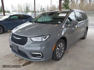 2021 Chrysler Pacifica Hybrid Touring L with VIN 2C4RC1L78MR581255, listed as a IAAI auction lot 41913443 with 71,193 mi miles. Bid and sale history available at carsss.com. Image 2.