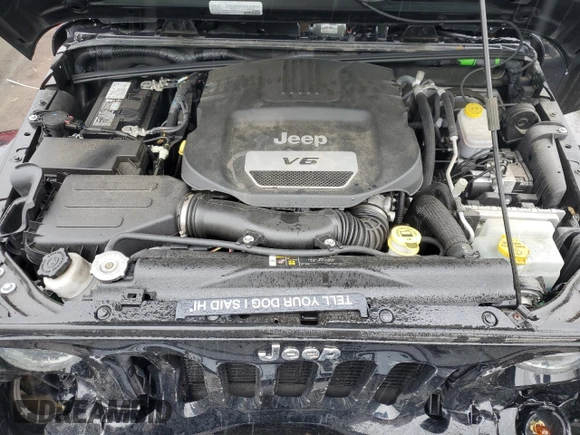 2017 Jeep Wrangler Unlimited Sport with VIN 1C4BJWDG8HL707809, listed as a Copart auction lot 57096085 with 34,959 mi miles and Salvage title. Bid and sale history available at DreamBid. Image 11.