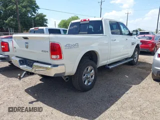 2018 Ram 2500 Laramie with VIN 3C6UR5FL0JG329369, listed as a IAAI auction lot 42539876 with 36,872 mi miles and . Bid and sale history available at DreamBid. Image 4.
