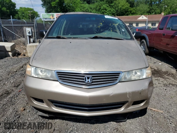 2000 Honda Odyssey LX z VIN 2HKRL1856YH626249, wystawiony jako Copart lot #57246805 z przebiegiem 179 546 mil mil oraz Szkoda całkowita • Salvage title. Historia ofert i sprzedaży dostępna na DreamBid. Obrazek 5.