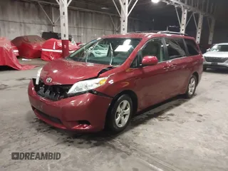2015 Toyota Sienna LE AAS with VIN 5TDKK3DC2FS609296, listed as a IAAI auction lot 41842166 with 160,342 mi miles. Bid and sale history available at carsss.com. Image 2.