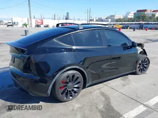 2021 Tesla Model Y Performance with VIN 5YJYGDEF9MF251738, listed as a IAAI auction lot 41708950 with 61,248 mi miles and . Bid and sale history available at DreamBid. Image 4.