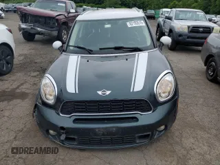 2014 MINI Countryman S with VIN WMWZC5C58EWP39797, listed as a Copart auction lot 62193515 with 84,989 mi miles and Salvage title. Bid and sale history available at DreamBid. Image 5.