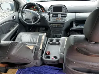 2006 Honda Odyssey EX-L z VIN 5FNRL38716B032192, wystawiony jako Copart lot #58402895 z przebiegiem 148 496 mil mil oraz Szkoda całkowita • Salvage title. Historia ofert i sprzedaży dostępna na DreamBid. Obrazek 8.