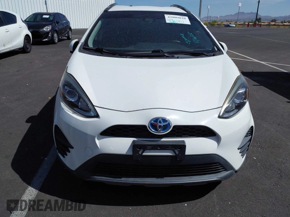 2018 Toyota Prius One with VIN JTDKDTB32J1599890, listed as a IAAI auction lot 42009820 with 57,959 mi miles and . Bid and sale history available at DreamBid. Image 6.