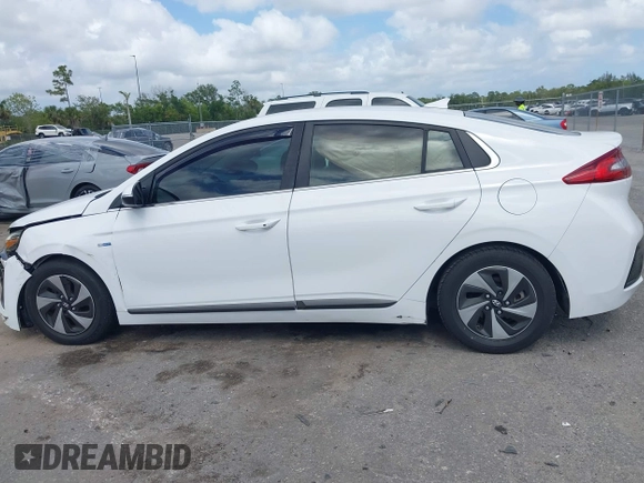 2018 Hyundai Ioniq SEL z VIN KMHC75LC2JU096795, wystawiony jako IAAI lot #42120793 z przebiegiem 111 058 mil mil oraz . Historia ofert i sprzedaży dostępna na DreamBid. Obrazek 14.