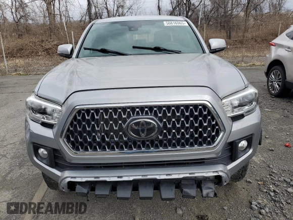 2018 Toyota Tacoma SR z VIN 3TMCZ5AN2JM122416, wystawiony jako Copart lot #61351225 z przebiegiem Nie podano mil oraz Szkoda całkowita • Salvage title. Historia ofert i sprzedaży dostępna na DreamBid. Obrazek 5.