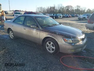 1997 Lexus ES 300 Luxury Sport Sdn with VIN JT8BF22G9V0042458, listed as a IAAI auction lot 41758589 with 1 mi miles. Bid and sale history available at carsss.com. Image 1.