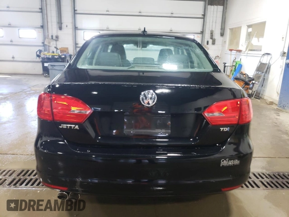 2011 Volkswagen Jetta TDI with VIN 3VWLL7AJXBM093417, listed as a Copart auction lot 57710435 with 104,484 mi miles and Clean title. Bid and sale history available at DreamBid. Image 6.