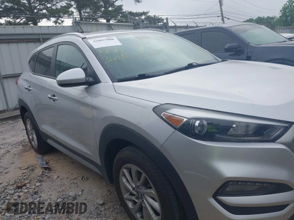 2017 Hyundai Tucson SE with VIN KM8J3CA44HU585714, listed as a IAAI auction lot 42097980 with 96,483 mi miles. Bid and sale history available at carsss.com. Image 13.