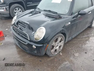 2006 MINI Convertible S with VIN WMWRH33516TF86823, listed as a IAAI auction lot 42184059 with Not Provided miles and . Bid and sale history available at DreamBid. Image 6.