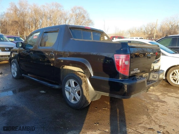 2009 Honda Ridgeline RTL with VIN 5FPYK16569B099998, listed as a IAAI auction lot 41403995 with 189,146 mi miles. Bid and sale history available at carsss.com. Image 3.