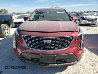 2022 Cadillac XT4 FWD Premium Luxury with VIN 1GYFZCR43NF154997, listed as a Copart auction lot 81942214 with 22,697 mi miles and Salvage title. Bid and sale history available at DreamBid. Image 5.