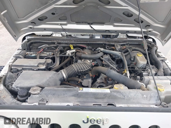 2011 Jeep Wrangler Sport with VIN 1J4AA2D18BL546069, listed as a IAAI auction lot 42139693 with 56,395 mi miles and . Bid and sale history available at carsss.com. Image 10.
