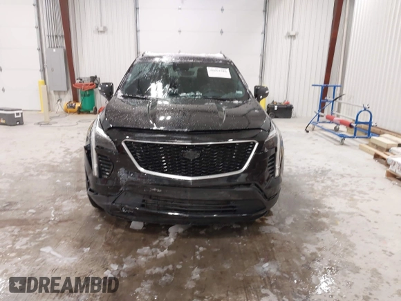 2020 Cadillac XT4 AWD Sport with VIN 1GYFZFR43LF090264, listed as a IAAI auction lot 41261586 with 65,859 mi miles and . Bid and sale history available at DreamBid. Image 12.