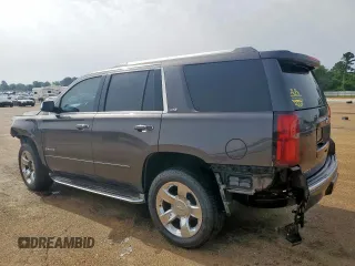 2015 Chevrolet Tahoe LTZ z VIN 1GNSCCKC8FR102859, wystawiony jako Copart lot #56755555 z przebiegiem 167 191 mil mil oraz Czysty tytuł • Clean title. Historia ofert i sprzedaży dostępna na DreamBid. Obrazek 2.