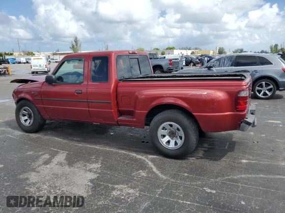 2002 Ford Ranger XL with VIN 1FTYR14V32TA65124, listed as a Copart auction lot 65009025 with 134,746 mi miles and Salvage title. Bid and sale history available at DreamBid. Image 2.