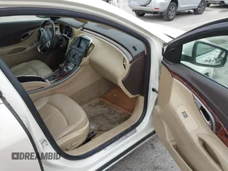 2012 Buick LaCrosse Leather z VIN 1G4GC5E35CF344992, wystawiony jako IAAI lot #41534317 z przebiegiem 134 026 mil mil oraz . Historia ofert i sprzedaży dostępna na DreamBid. Obrazek 5.