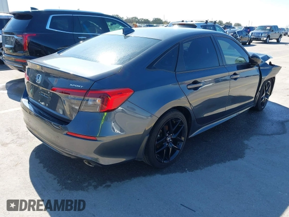 2022 Honda Civic Sedan Sport with VIN 2HGFE2F58NH597686, listed as a IAAI auction lot 41489050 with 44,161 mi miles. Bid and sale history available at carsss.com. Image 4.