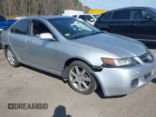 2004 Acura TSX w/Navigation with VIN JH4CL96904C039320, listed as a IAAI auction lot 42083615 with 195,844 mi miles. Bid and sale history available at carsss.com. Image 1.