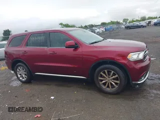 2018 Dodge Durango SXT with VIN 1C4RDHAG5JC100570, listed as a IAAI auction lot 42209415 with 169,478 mi miles and . Bid and sale history available at DreamBid. Image 14.