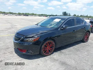 2013 Acura ILX Technology z VIN 19VDE1F72DE014291, wystawiony jako IAAI lot #42221550 z przebiegiem 134 825 mil mil oraz . Historia ofert i sprzedaży dostępna na DreamBid. Obrazek 19.