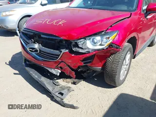 2016 Mazda CX-5 Sport with VIN JM3KE4BY7G0805631, listed as a IAAI auction lot 42028606 with 93,659 mi miles and . Bid and sale history available at carsss.com. Image 6.
