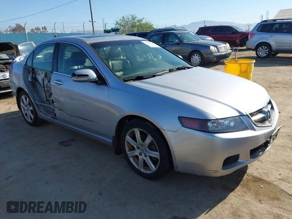 2004 Acura TSX w/Navigation with VIN JH4CL96944C002982, listed as a IAAI auction lot 41855710 with 165,129 mi miles. Bid and sale history available at carsss.com. Image 1.