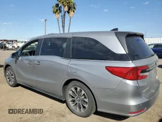 2021 Honda Odyssey EX-L with VIN 5FNRL6H77MB011099, listed as a Copart auction lot 47412535 with 148,004 mi miles and Salvage Title. Bid and sale history available at DreamBid. Image 2.