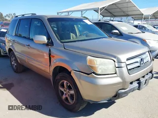 2006 Honda Pilot EX with VIN 5FNYF28416B017534, listed as a IAAI auction lot 41656789 with 241,343 mi miles and . Bid and sale history available at DreamBid. Image 1.