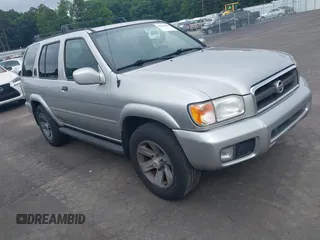 2003 Nissan Pathfinder LE z VIN JN8DR09Y73W804964, wystawiony jako IAAI lot #42502449 z przebiegiem 183 333 mil mil oraz . Historia ofert i sprzedaży dostępna na DreamBid. Obrazek 1.