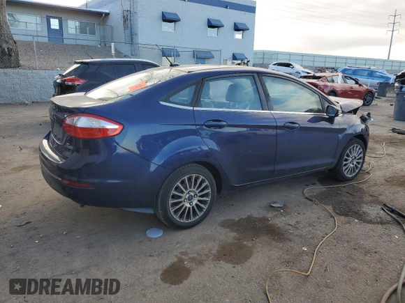 2016 Ford Fiesta Titanium z VIN 3FADP4CJ5GM175110, wystawiony jako Copart lot #89137195 z przebiegiem 129 193 mil mil oraz Szkoda całkowita • Salvage title. Historia ofert i sprzedaży dostępna na DreamBid. Obrazek 3.