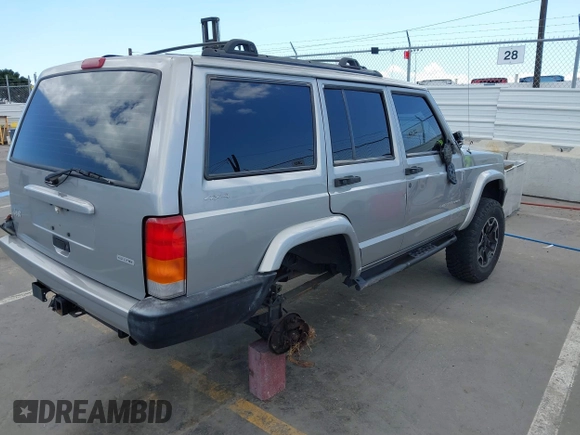2000 Jeep Cherokee z VIN 1J4FF48S1YL200458, wystawiony jako IAAI lot #42239282 z przebiegiem Nie podano mil oraz . Historia ofert i sprzedaży dostępna na DreamBid. Obrazek 4.