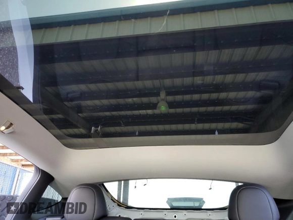 2024 Tesla Model Y Long Range with VIN 7SAYGDEEXRA288960, listed as a Copart auction lot 60801525 with 18,942 mi miles and Salvage title. Bid and sale history available at DreamBid. Image 10.