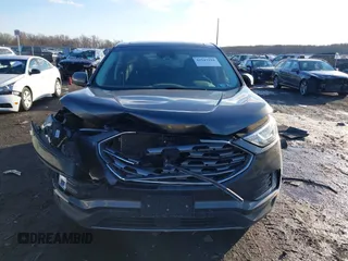 2019 Ford Edge SEL z VIN 2FMPK4J94KBB07837, wystawiony jako IAAI lot #41347294 z przebiegiem 90 668 mil mil oraz . Historia ofert i sprzedaży dostępna na DreamBid. Obrazek 12.