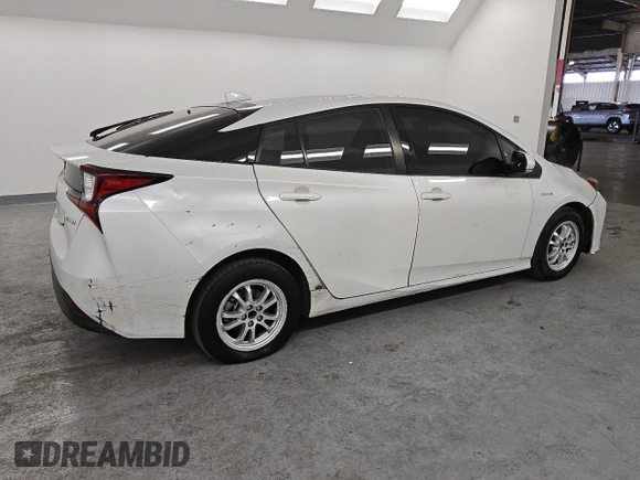 2021 Toyota Prius L Eco with VIN JTDKAMFU3M3141253, listed as a Copart auction lot 45244345 with 183,396 mi miles and Clean Title. Bid and sale history available at DreamBid. Image 3.
