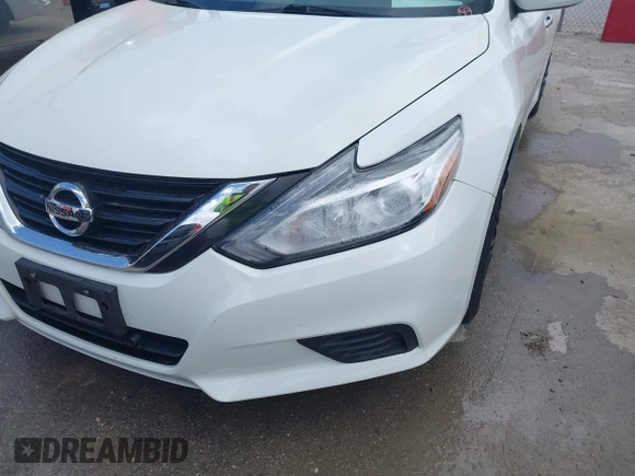 2016 Nissan Altima SR with VIN 1N4AL3AP0GC223999, listed as a IAAI auction lot 41838999 with 159,918 mi miles and . Bid and sale history available at carsss.com. Image 6.