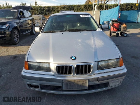 1997 BMW 3 Series 318i with VIN WBACC9328VEE57445, listed as a Copart auction lot 84380934 with 0 mi miles and Salvage Title. Bid and sale history available at carsss.com. Image 5.