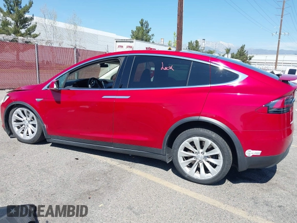 2016 Tesla Model X 70D with VIN 5YJXCAE23GF002262, listed as a IAAI auction lot 41839084 with 173,658 mi miles. Bid and sale history available at carsss.com. Image 14.