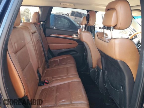 2013 Jeep Grand Cherokee Overland with VIN 1C4RJFCT8DC523252, listed as a Copart auction lot 48706965 with 173,325 mi miles and Salvage Title. Bid and sale history available at carsss.com. Image 11.