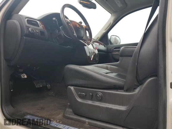 2013 Chevrolet Tahoe LTZ with VIN 1GNSCCE02DR340527, listed as a Copart auction lot 43183805 with 111,696 mi miles and Salvage title. Bid and sale history available at DreamBid. Image 7.