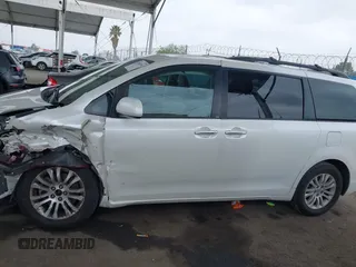 2015 Toyota Sienna XLE with VIN 5TDYK3DC5FS640102, listed as a IAAI auction lot 41885194 with 119,972 mi miles. Bid and sale history available at carsss.com. Image 14.
