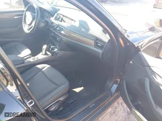 2013 BMW X1 28i with VIN WBAVM1C51DVW41977, listed as a IAAI auction lot 41607741 with 158,258 mi miles. Bid and sale history available at carsss.com. Image 5.