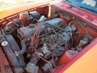 1978 Datsun 280ZX z VIN HLS30436722, wystawiony jako Copart lot #80422674 z przebiegiem 80 326 mil mil oraz Tytuł czysty. Historia ofert i sprzedaży dostępna na DreamBid. Obrazek 11.