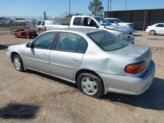 2001 Chevrolet Malibu LS with VIN 1G1NE52J216178803, listed as a IAAI auction lot 41976546 with 119,127 mi miles. Bid and sale history available at carsss.com. Image 3.