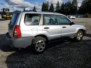 2003 Subaru Forester X with VIN JF1SG63643H727564, listed as a Copart auction lot 77736064 with 167,293 mi miles and Salvage Title. Bid and sale history available at carsss.com. Image 3.