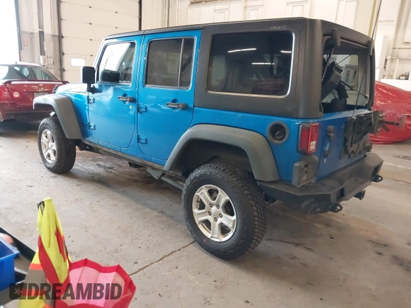 2015 Jeep Wrangler Unlimited Rubicon with VIN 1C4BJWFG7FL661643, listed as a IAAI auction lot 41291385 with 112,785 mi miles. Bid and sale history available at carsss.com. Image 3.