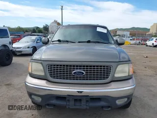 1999 Ford Expedition XLT z VIN 1FMPU18L3XLB21018, wystawiony jako IAAI lot #42003908 z przebiegiem Nie podano mil oraz . Historia ofert i sprzedaży dostępna na DreamBid. Obrazek 6.